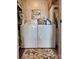 Functional laundry room with washer, dryer, and rustic accents at 171 Westmoreland Rd, Mooresville, NC 28115