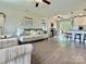 Bright living room featuring stylish furnishings, hardwood floors, and an open floor plan at 171 Westmoreland Rd, Mooresville, NC 28115