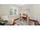 Bright office space featuring a desk, chair, and large window at 1824 Hall Ave, Charlotte, NC 28205