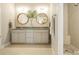 Stylish bathroom with double vanity, granite countertop, and a modern shower at 18721 Dumbarton Oaks Dr, Cornelius, NC 28031