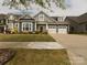 Charming home with a well-manicured lawn and a two-car garage at 18721 Dumbarton Oaks Dr, Cornelius, NC 28031