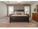 Serene main bedroom with a tray ceiling, plush carpet, and ample natural light at 18721 Dumbarton Oaks Dr, Cornelius, NC 28031