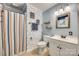 Bathroom featuring tub-shower, vanity, and matching towel rack and mirror at 1938 Hickory Dr, Lancaster, SC 29720