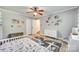 Bedroom with hard floors, natural light, ceiling fan, and room for activities at 1938 Hickory Dr, Lancaster, SC 29720