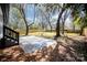 Backyard features a concrete patio and a new wooden fence at 2014 Sandhurst Dr, Charlotte, NC 28205