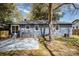 Exterior view of home featuring patio and new landscaping at 2014 Sandhurst Dr, Charlotte, NC 28205