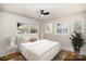 Serene bedroom featuring modern furnishings, stylish decor, and ample natural light at 2014 Sandhurst Dr, Charlotte, NC 28205