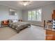 Comfortable bedroom featuring a window view and neutral carpeting at 2058 Manila Bay Ln, Fort Mill, SC 29708