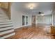 Spacious living room with hardwood floors and staircase at 2058 Manila Bay Ln, Fort Mill, SC 29708