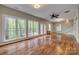 Open living room featuring hardwood floors and large windows at 2058 Manila Bay Ln, Fort Mill, SC 29708