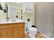 Bathroom with a shower and vanity cabinet at 2315 Collins Dr, Albemarle, NC 28001