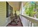 Spacious porch featuring rocking chairs at 2315 Collins Dr, Albemarle, NC 28001