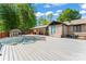 View of the pool, porch, and deck in a backyard at 2615 Toddville Rd, Charlotte, NC 28214