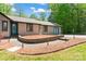 Charming one-story home featuring a brick chimney, well-manicured lawn, and inviting curb appeal at 2615 Toddville Rd, Charlotte, NC 28214
