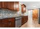 Beautiful kitchen with granite countertops, stainless steel dishwasher, and a convenient pantry at 2615 Toddville Rd, Charlotte, NC 28214