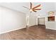 Spacious living room with hardwood flooring, fan, and lots of natural light at 2615 Toddville Rd, Charlotte, NC 28214
