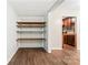 Well-organized pantry with ample shelving, offering convenient storage and easy access to kitchen essentials at 2615 Toddville Rd, Charlotte, NC 28214