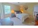 Cozy bedroom with a comfortable queen-sized bed and decorative artwork at 3063 Wimbledon Ln, Rock Hill, SC 29732