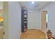 Upstairs hallway features wood floors, storage closet, and access to bedrooms at 3063 Wimbledon Ln, Rock Hill, SC 29732