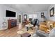 Inviting living room with a fireplace, comfortable seating, and a cozy rug at 335 Ridgewood Dr, Mt Ulla, NC 28125