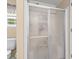 Bathroom featuring a glass-enclosed shower and a white toilet at 335 Ridgewood Dr, Mt Ulla, NC 28125