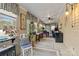 Charming sunroom with many windows, a ceiling fan, and a tiled floor at 335 Ridgewood Dr, Mt Ulla, NC 28125