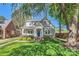 Charming two-story home with a welcoming front porch and well-maintained landscaping at 3709 Commonwealth Ave, Charlotte, NC 28205