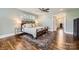 Large main bedroom featuring an area rug and multiple windows for natural light at 3709 Commonwealth Ave, Charlotte, NC 28205