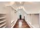 Spacious walk-in closet with custom shelving and ample storage space at 3709 Commonwealth Ave, Charlotte, NC 28205