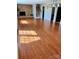 Finished basement with hardwood floors and a brick fireplace at 3713 Saint Regis Dr, Gastonia, NC 28056