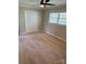 Bedroom with ceiling fan, double closets, neutral carpet, and bright windows at 3713 Saint Regis Dr, Gastonia, NC 28056