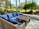 Beautiful patio with plush seating, overlooking a scenic golf course and surrounding greenery at 3713 Saint Regis Dr, Gastonia, NC 28056