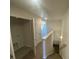 Bright hallway featuring a closet, access to stairs, and neutral carpeting, offering practical living at 3776 Yorkshire Pl, Terrell, NC 28682
