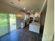 Bright kitchen with a view of the patio from the sliding glass door at 3776 Yorkshire Pl, Terrell, NC 28682