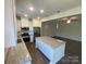Modern kitchen with granite countertops, stainless steel appliances, and an island at 3776 Yorkshire Pl, Terrell, NC 28682