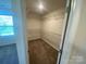 Walk-in closet with wire shelving, providing ample storage space, and natural light at 3776 Yorkshire Pl, Terrell, NC 28682