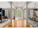 Bright foyer with hardwood floors, soaring ceilings, and views of the front yard at 3819 Gleneagles Rd, Charlotte, NC 28210