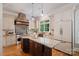 Gourmet kitchen features granite countertops, custom cabinets, and stainless steel appliances at 3819 Gleneagles Rd, Charlotte, NC 28210