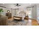 Bright main bedroom featuring a plush bed, natural light, and neutral colors creating a serene retreat at 3819 Gleneagles Rd, Charlotte, NC 28210