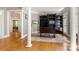 Spacious office with hardwood floors, built-in bookshelves, and natural light at 3819 Gleneagles Rd, Charlotte, NC 28210