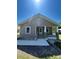 Charming single-story home with a cozy front porch and well-maintained landscaping at 427 W Whitley St, Norwood, NC 28128
