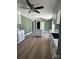 Well-lit kitchen with ample cabinet space, modern countertops, and an island at 427 W Whitley St, Norwood, NC 28128