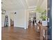 Inviting entryway featuring hardwood floors, wainscoting, and an open view into the living space at 4606 Gatesmills Ave, Charlotte, NC 28213