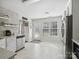 Bright kitchen with stainless steel appliances, white cabinets, and a tile backsplash at 4665 Madeline Dr, Rock Hill, SC 29732