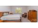 Bedroom featuring carpeted floors, natural light, and classic furnishings at 5043 Antebellum Dr, Iron Station, NC 28080