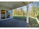 Covered back patio overlooking the backyard at 5043 Antebellum Dr, Iron Station, NC 28080