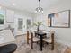 Bright dining area with access to the backyard, adjacent to the kitchen at 528 Waco Rd, Kings Mountain, NC 28086