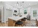Modern kitchen island with white countertops and seating, perfect for entertaining at 528 Waco Rd, Kings Mountain, NC 28086