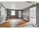 Bright living room featuring hardwood floors, neutral wall colors, and lots of natural light at 545 S Green St, Statesville, NC 28677