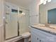 Bathroom featuring a granite countertop and glass door shower at 6745 Thermal Rd, Charlotte, NC 28211